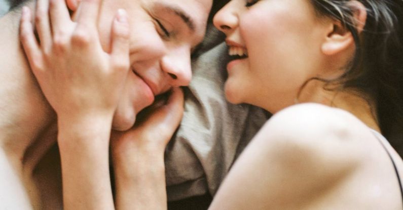 Romance - Man and Woman Lying on Bed