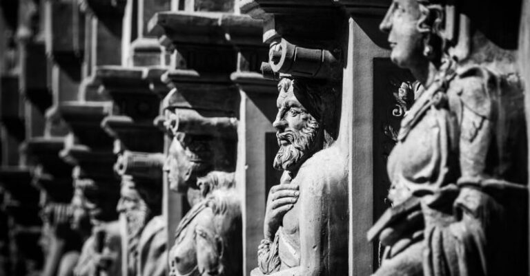 History - Grayscale Photography of Statues